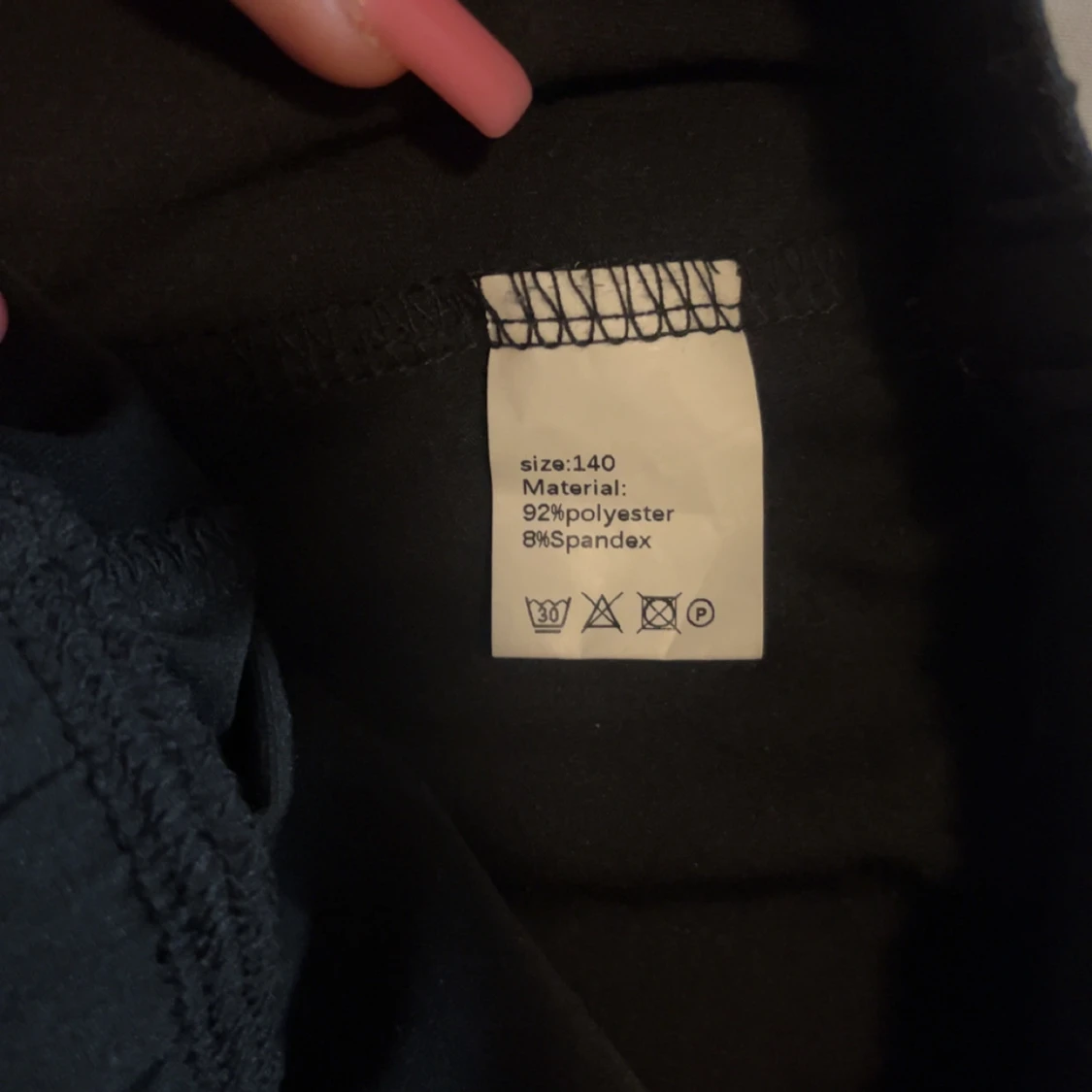 Svarta shorts i polyester med resår - 1