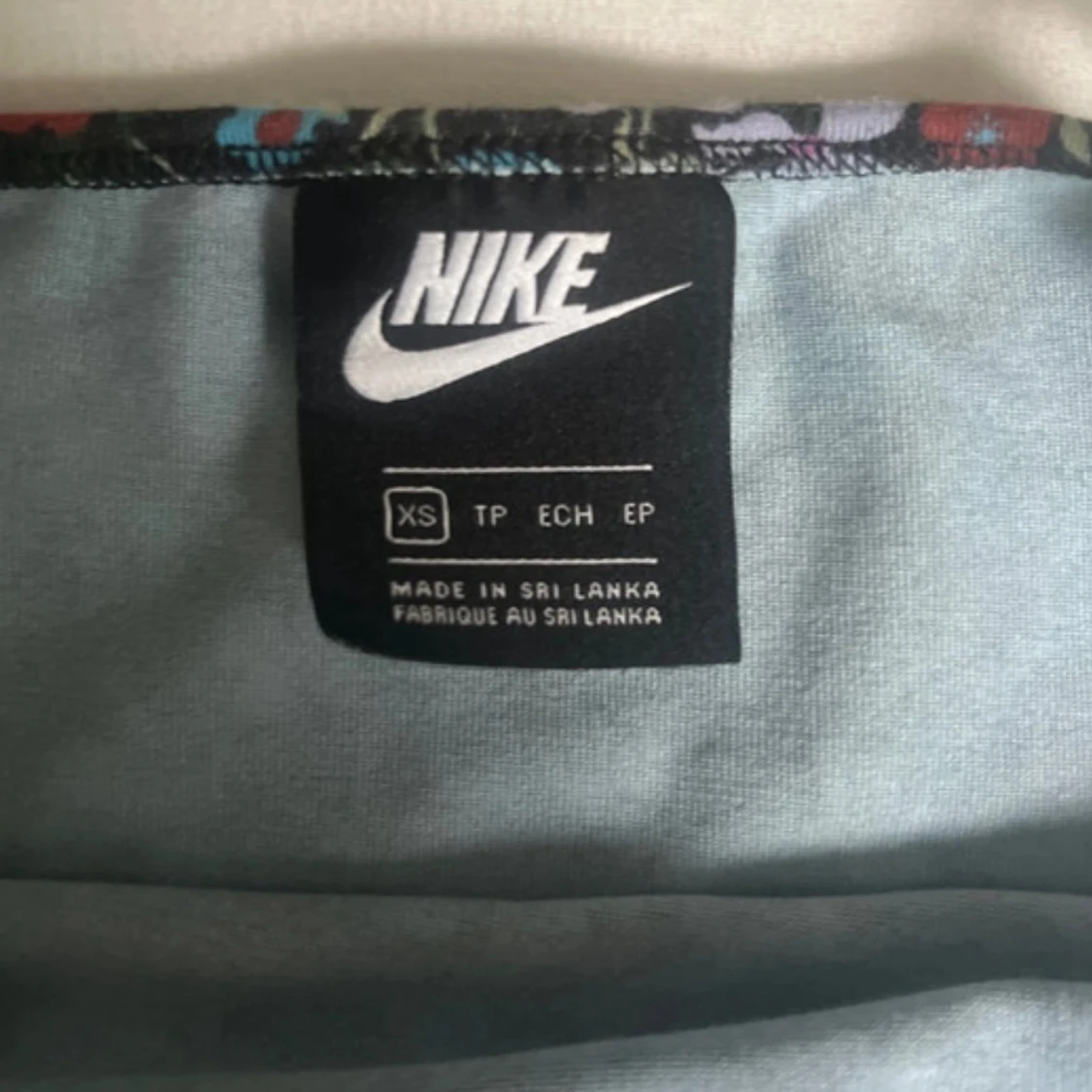 Blommig kortklänning från Nike XS - 2