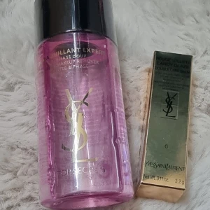YSL Premium Beautykit  - Säljer ett YSL Rouge Volupté Candy Glaze Double Care Balm i färgen 6 Burgundy Temptation, med lyxigt silverhylsa och guldig detalj. Medföljer även YSL Top Secrets tvåfasad makeup remover i rosa flaska, 125 ml. Allt nytt och oanvänt.