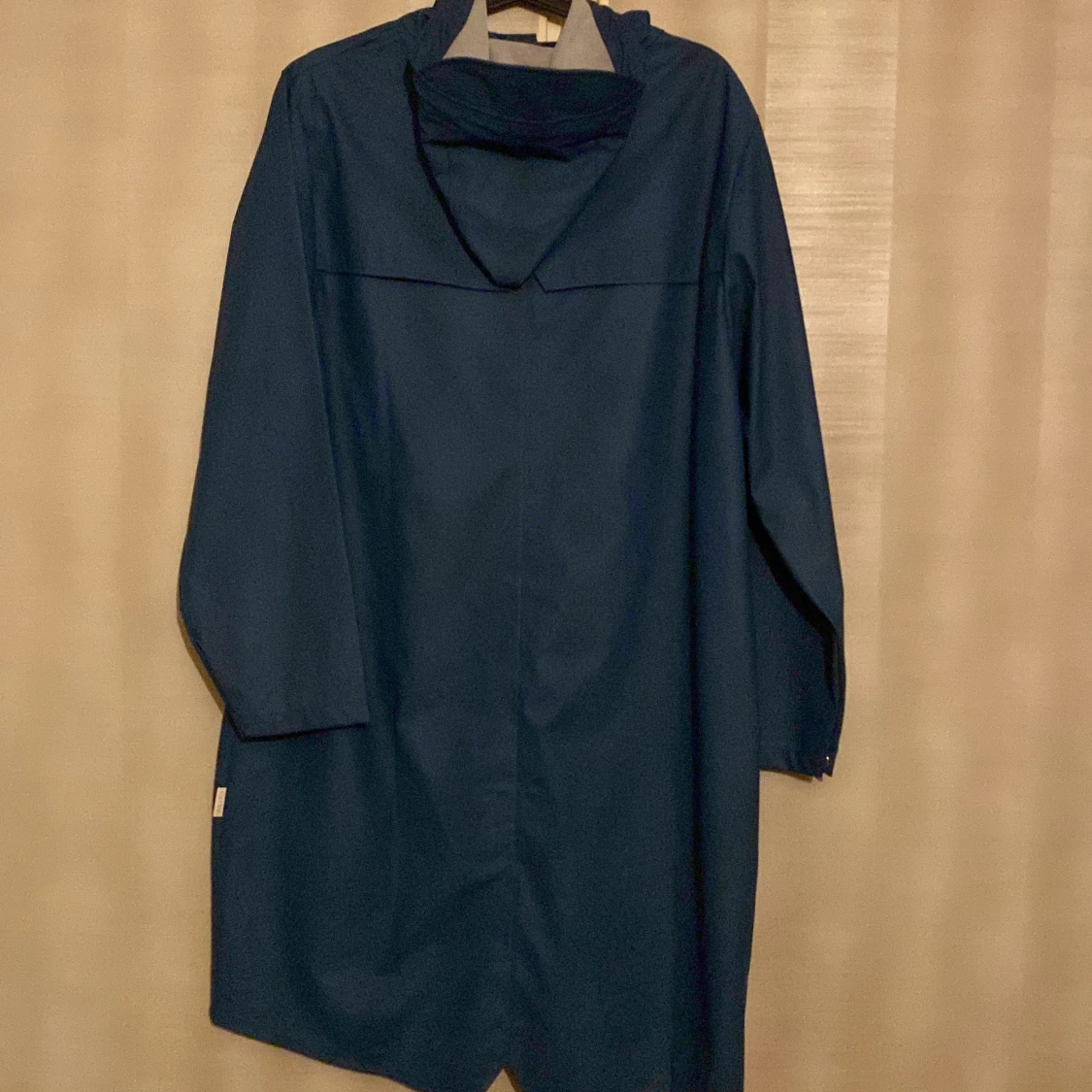 Blå regnjacka från Rains - 1