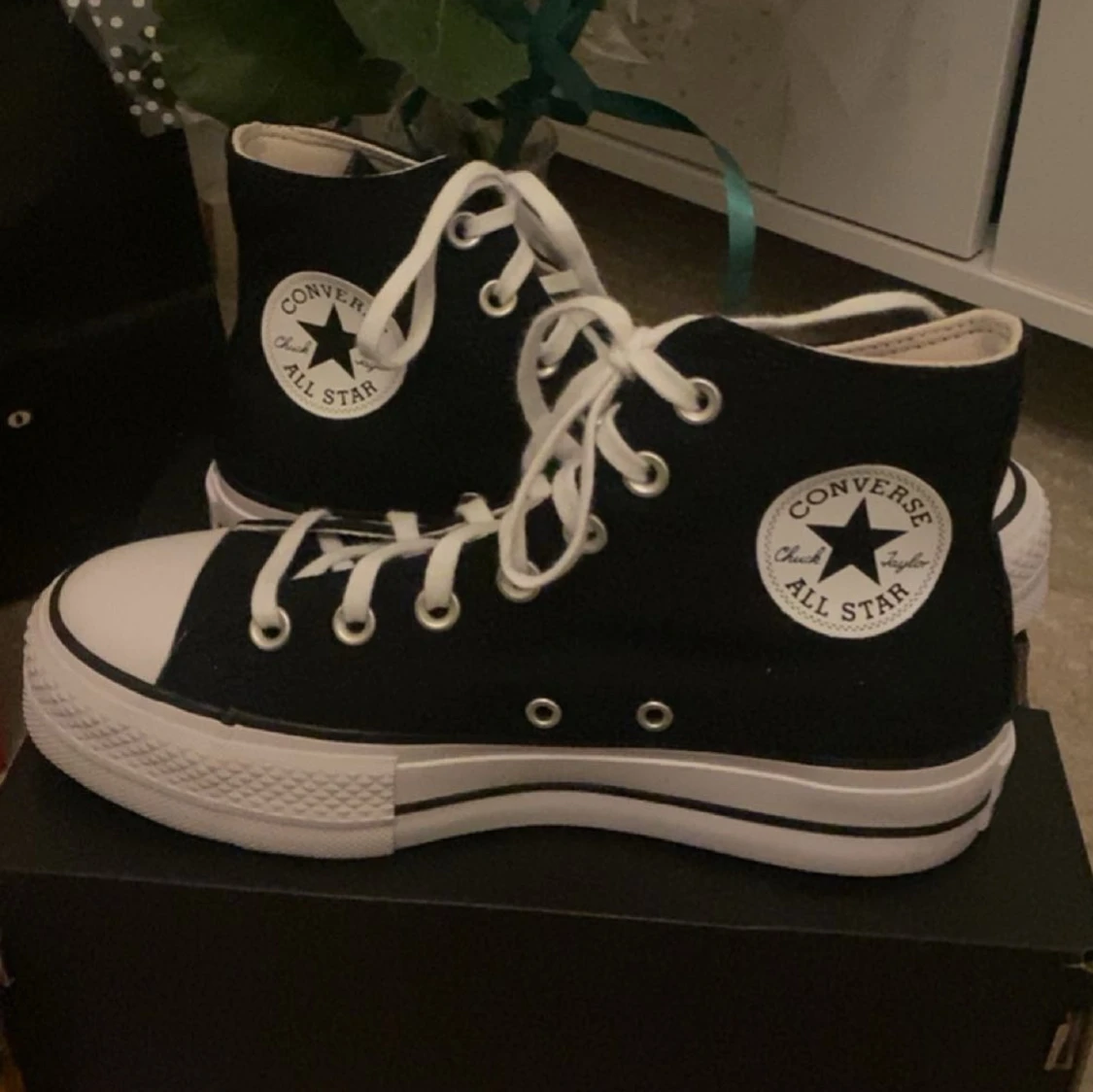 Svarta Converse All Star sneakers