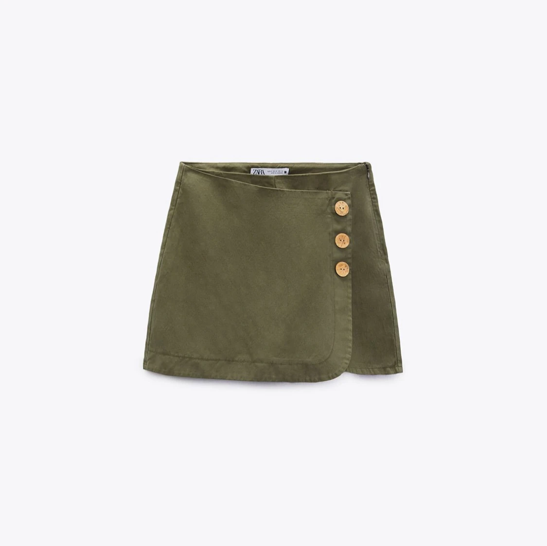 Olivgrön omlottkjol med knappar från Zara