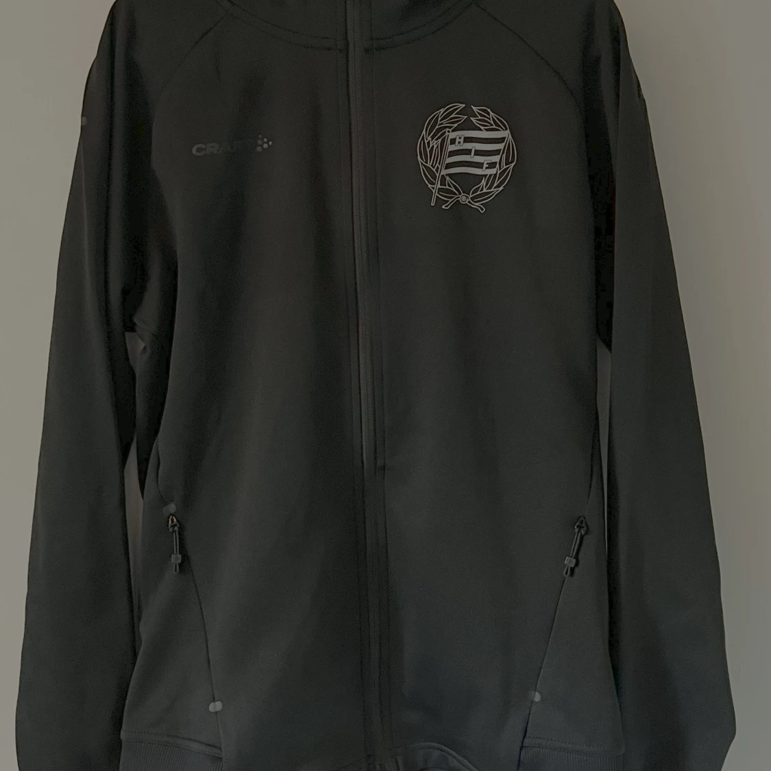 Svart zip från Craft, storlek S