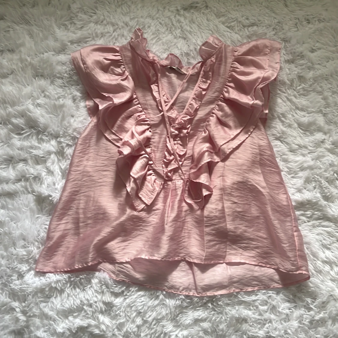 Rosa volangblus från Kappahl