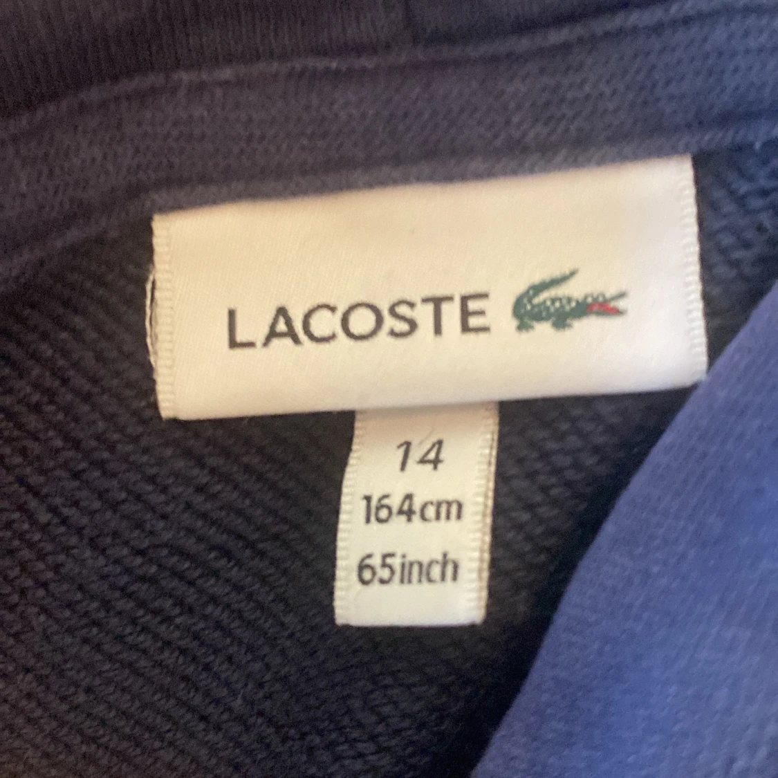 Blå hoodie från Lacoste - 2