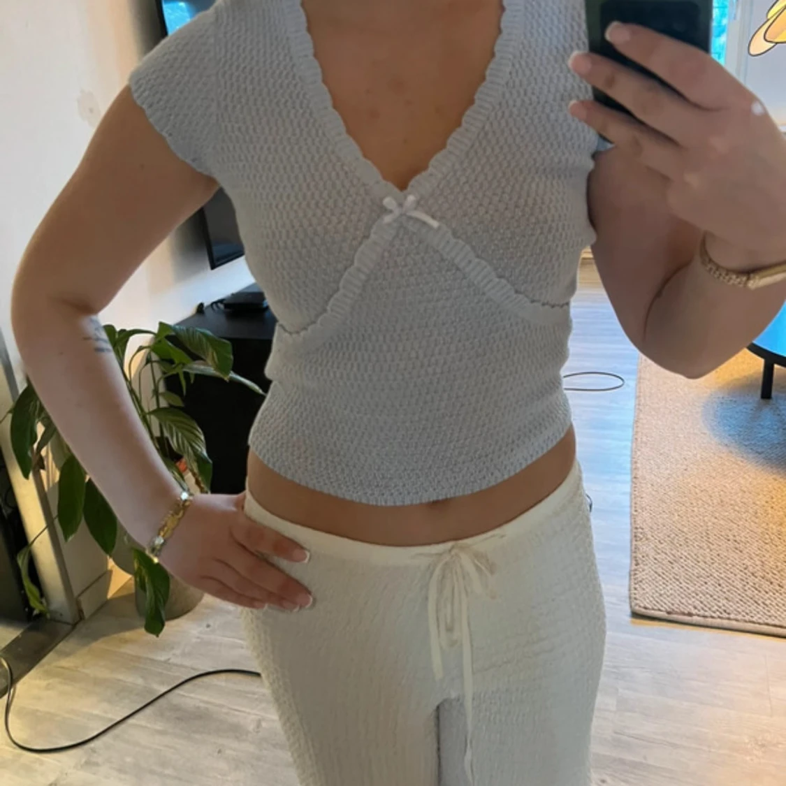 Ljusblå croppad blus med rosett