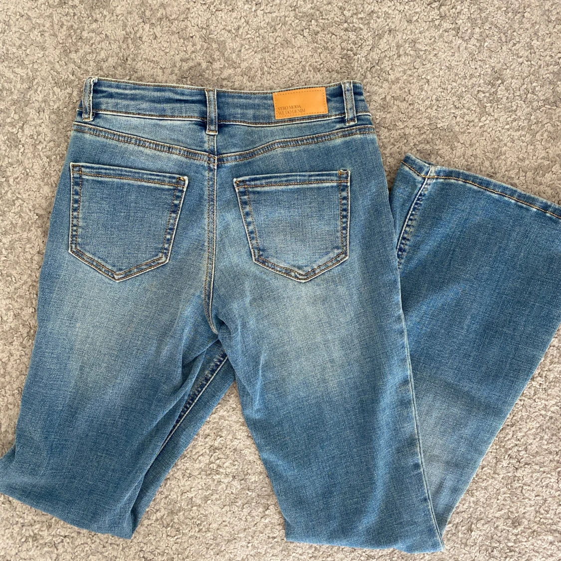 Blå lågmidjade bootcut jeans - 1