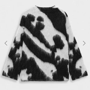 Stickad tröja - Stickad tröja från Stockholm lm helt ny!