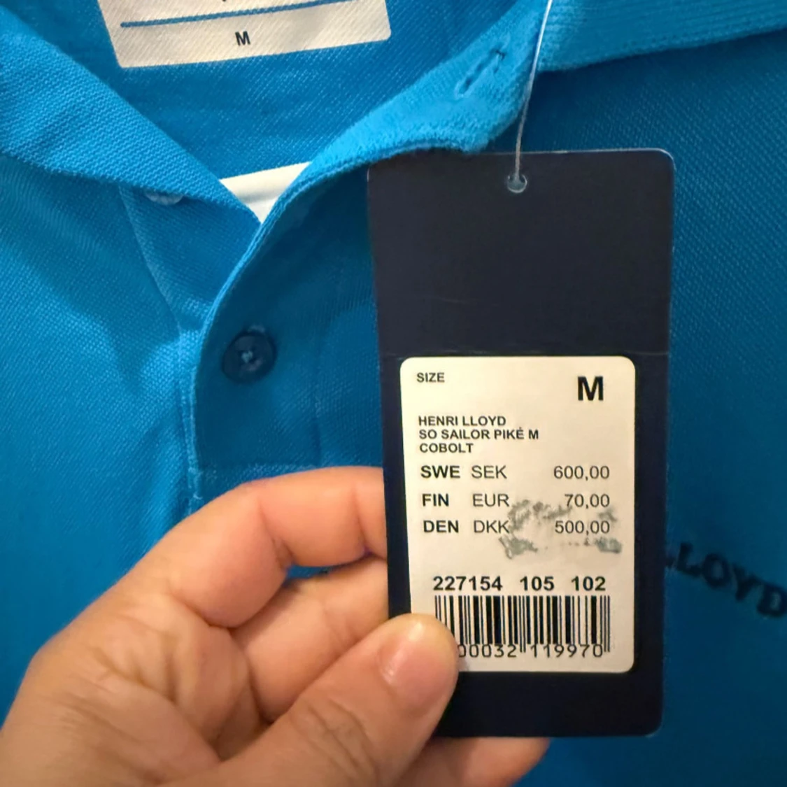 Blå pikétröja från Henri Lloyd - 1