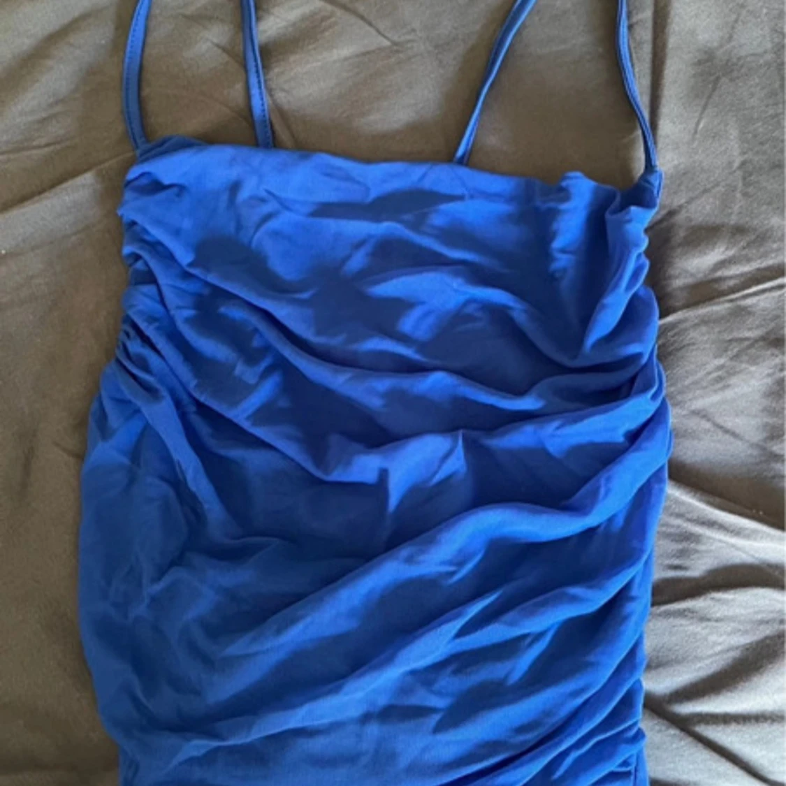 Blått linne med tunna axelband