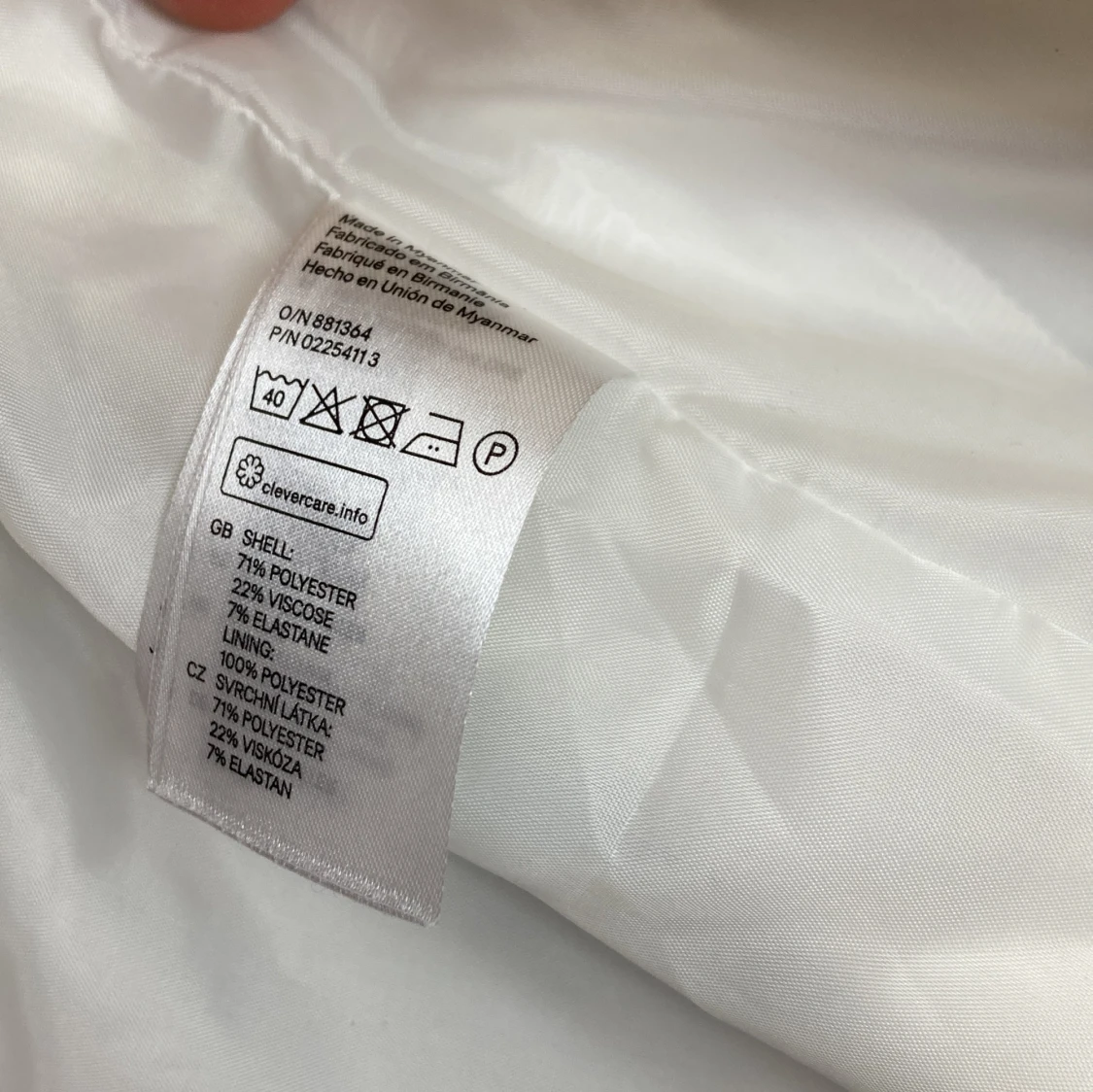 Vit kavaj med dragkedjedetaljer - 3