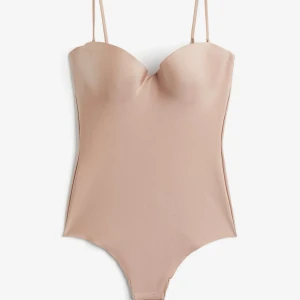Body hm - Såå fin body från H&M i en rosa färg som är i storlek 75A. Aldrig använd endast testad!
