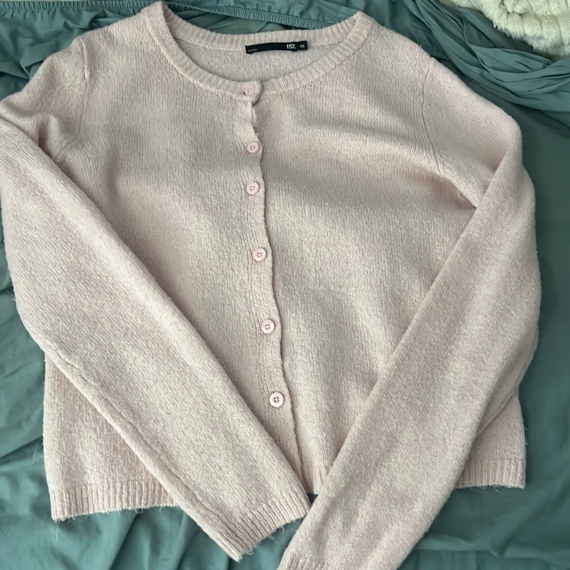 Ljusrosa stickad kofta från lager 157