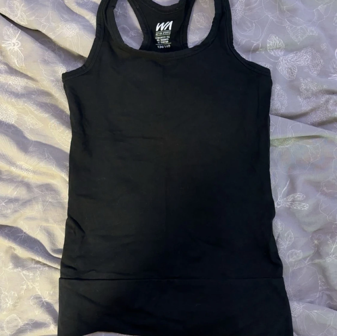 Svart linnetopp från WA Action Sports