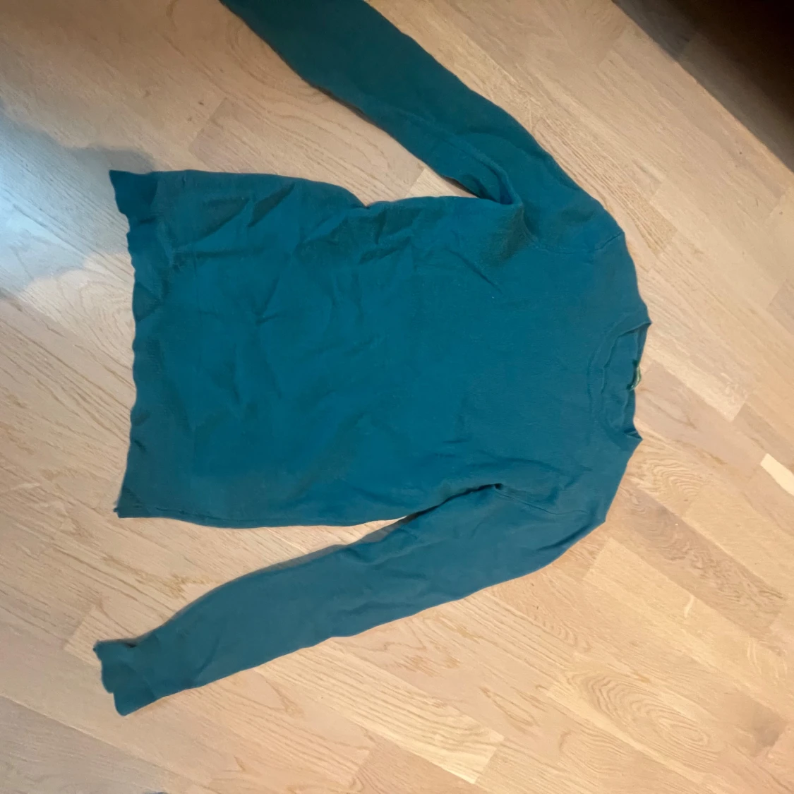 Mörkgrön långärmad tröja