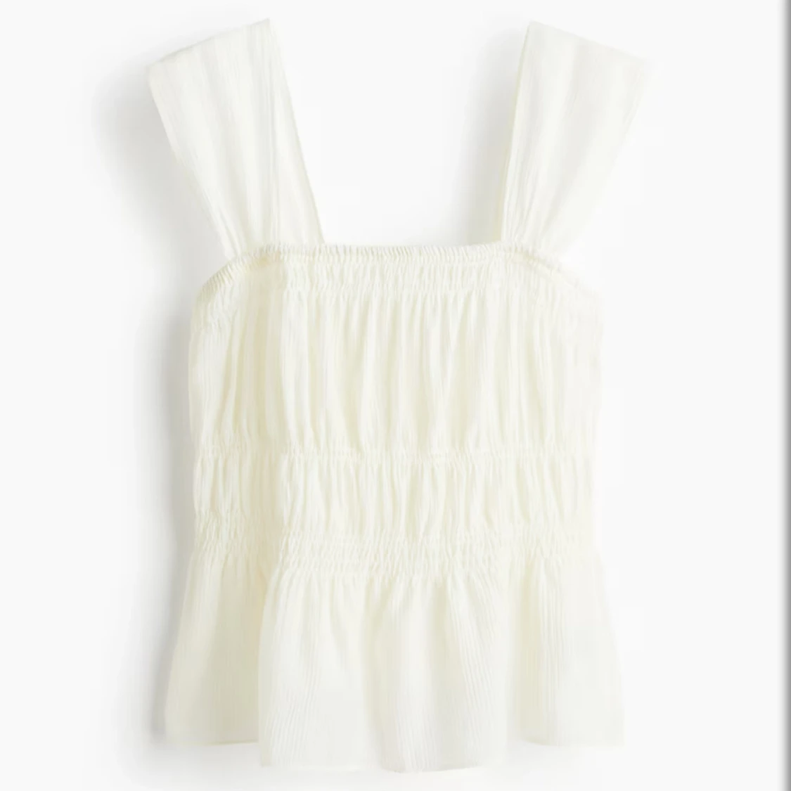 Vit smockad linnetopp från H&M