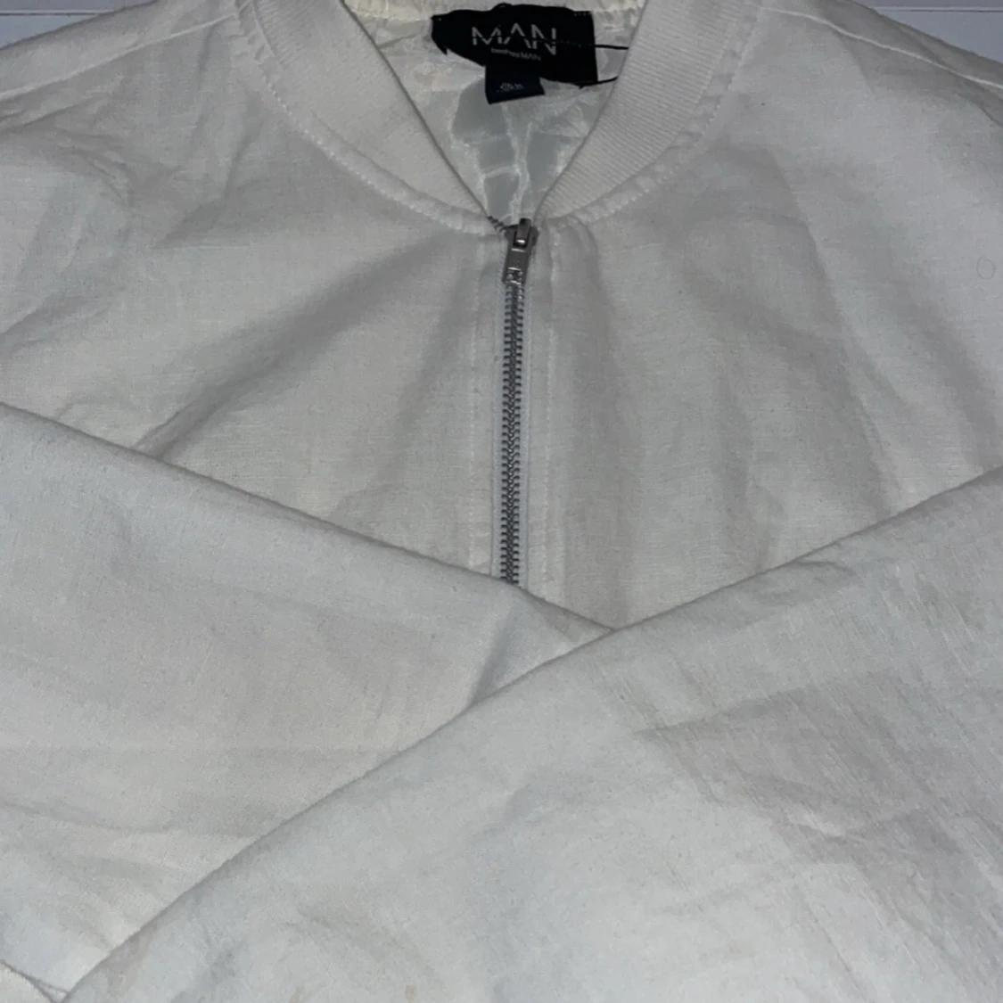 Vit bomberjacka från MAN - 1