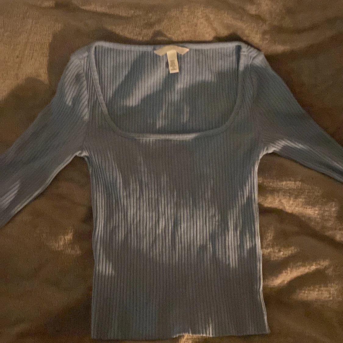 Ljusblå ribbad topp