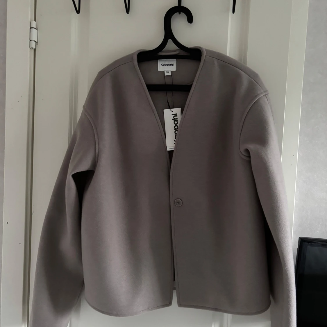 Beige kappa från Kappahl - 1