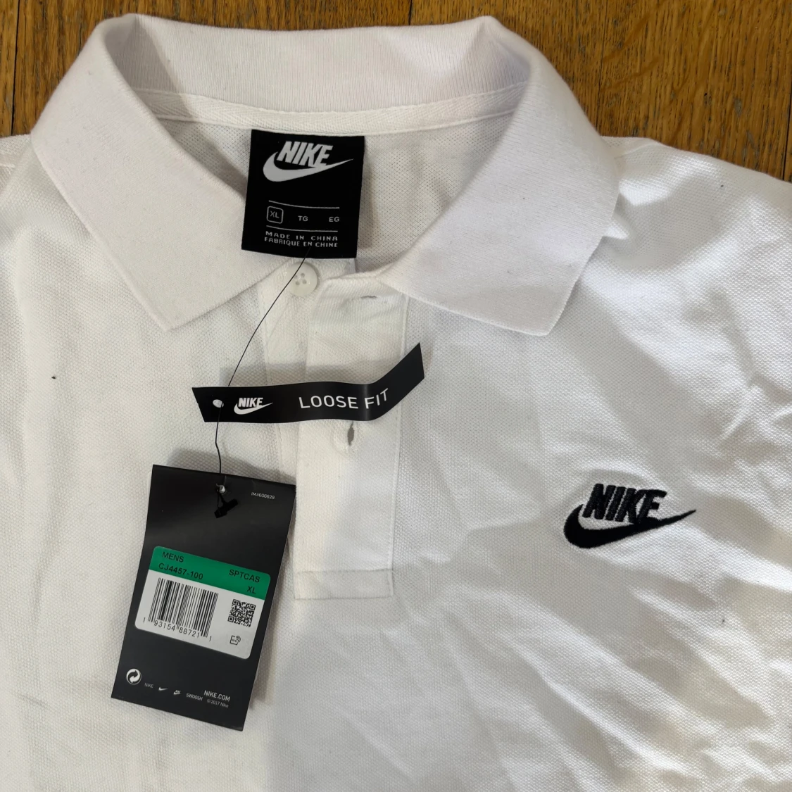 Vit pikétröja från Nike - 2