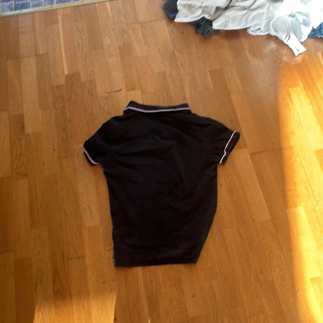 Svart pikétröja från Moncler - 2