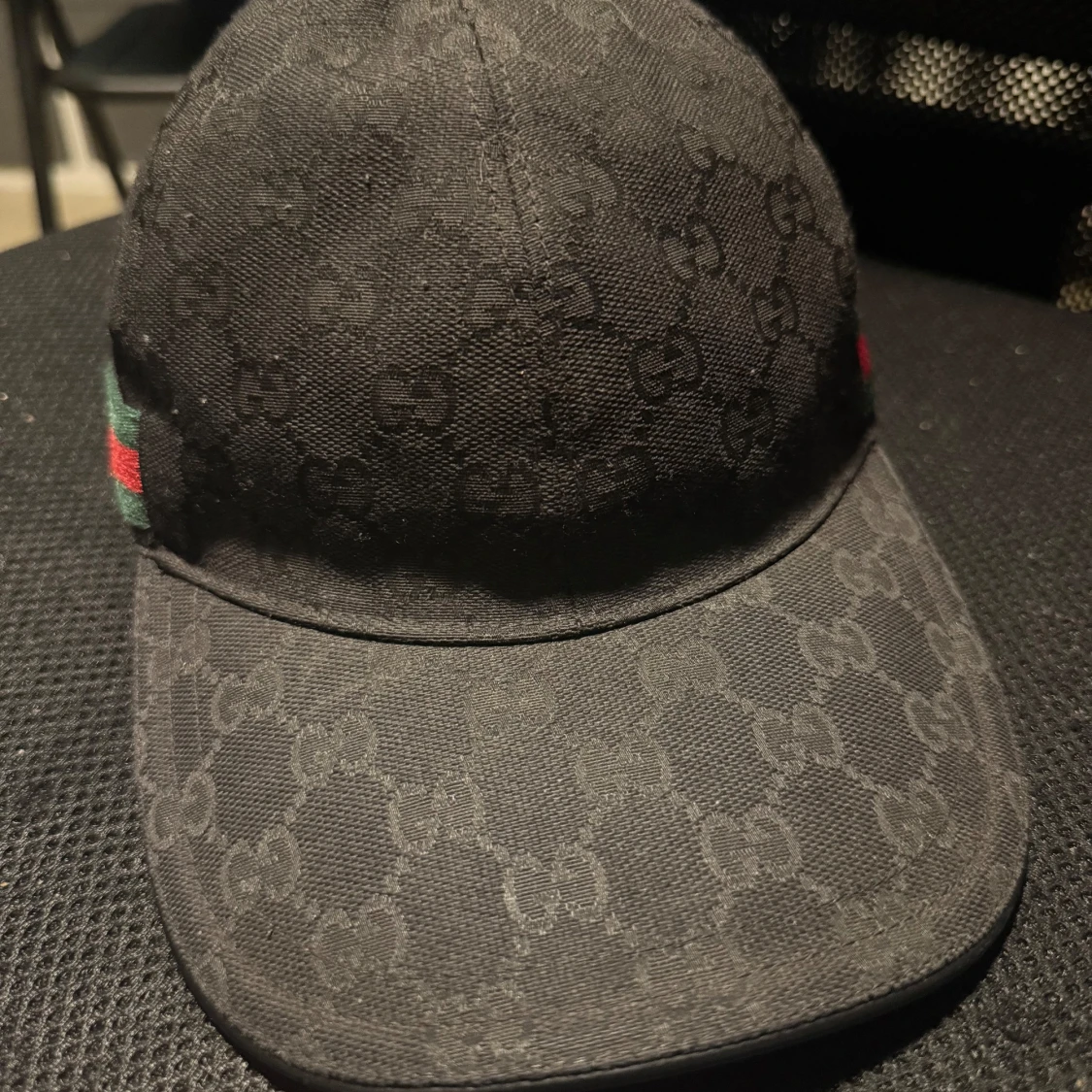 Svart keps från Gucci med monogram