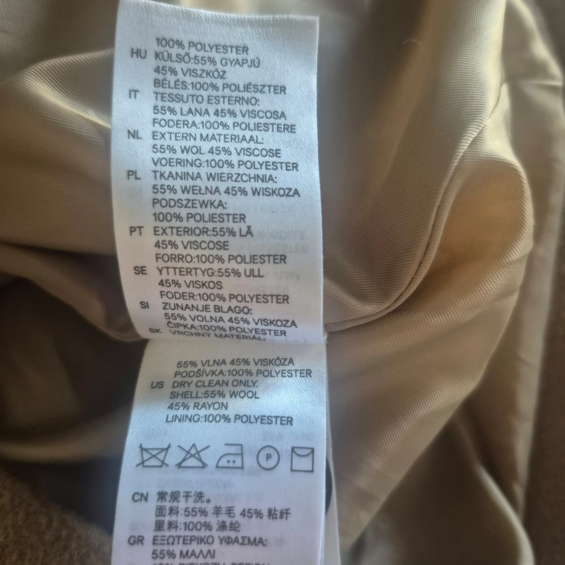 Beige kappa med ankardetalj - 2