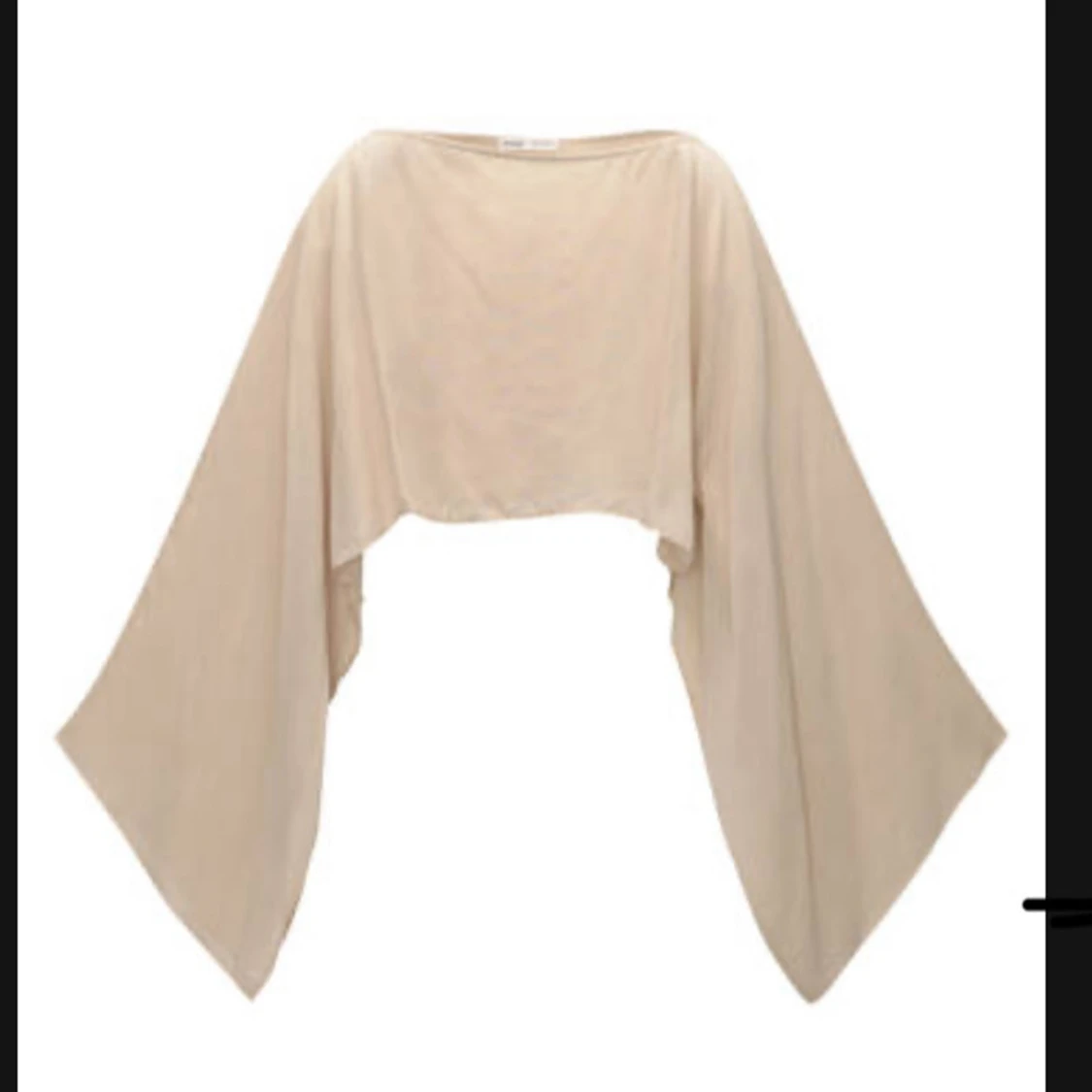 Beige croppad poncho/cape från pull and bear
