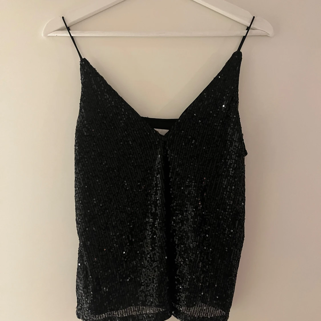 Svart paljettlinne från H&M - 1