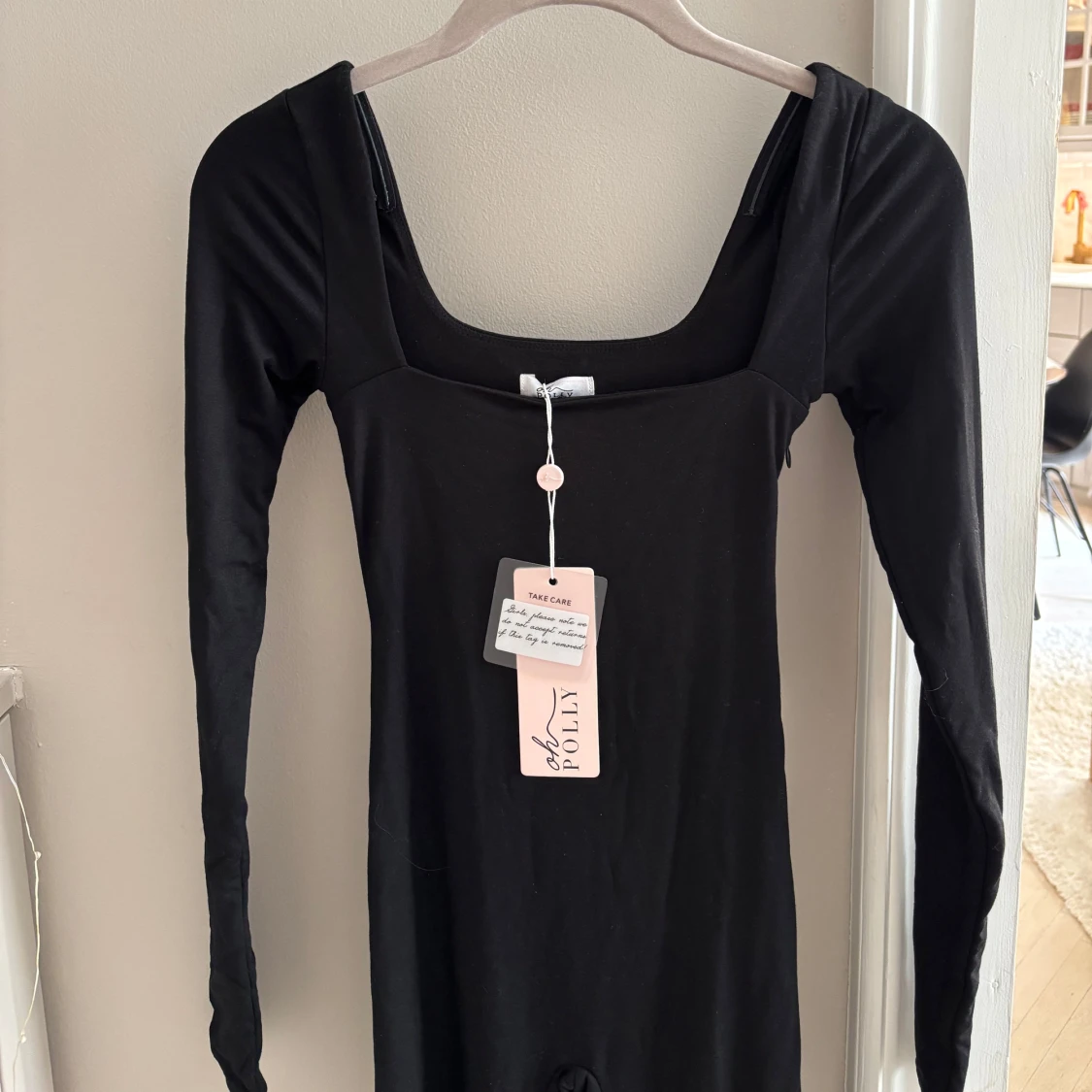 Svart långärmad jumpsuit - Oh Polly - 2