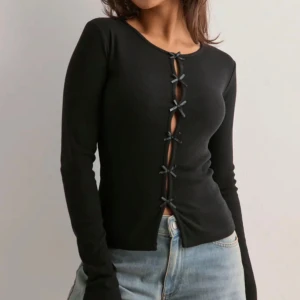 Nelly rosett tröja - Säljer denna tröja från Nelly, super fint skick!