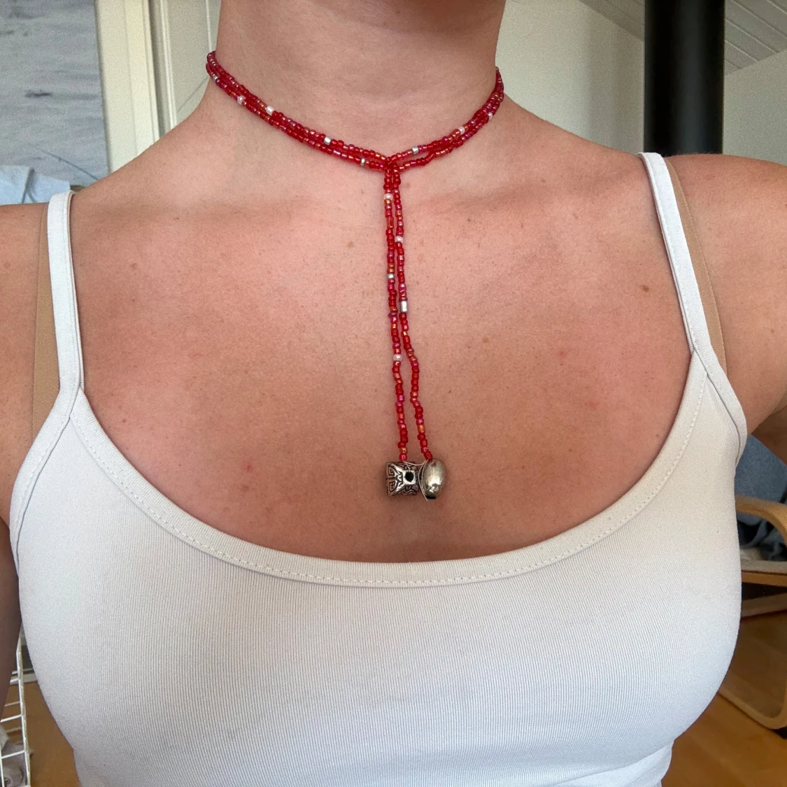 pärlhalsband med locker - 1