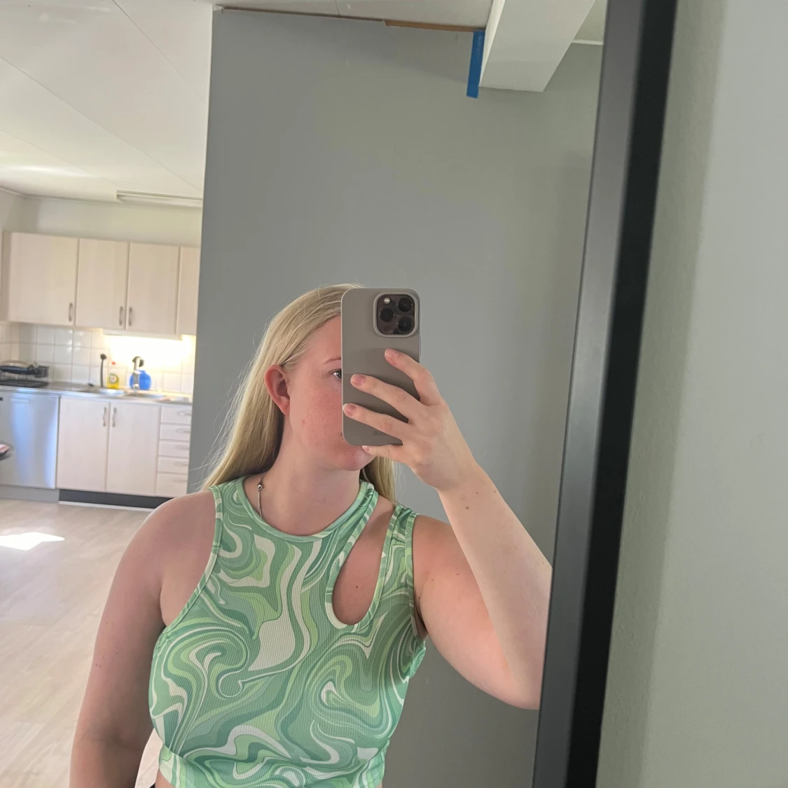 Grön swirl mönstrad linnetopp