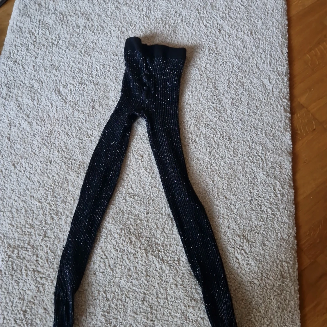 Svarta glittriga strumpbyxor Kappahl - 1