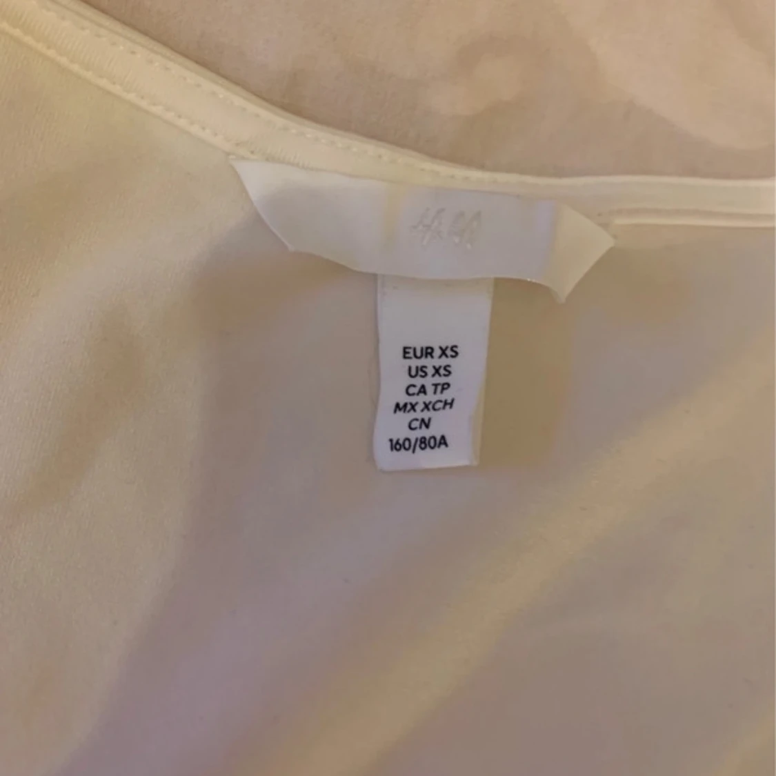 Vit ärmlös topp från H&M - 1