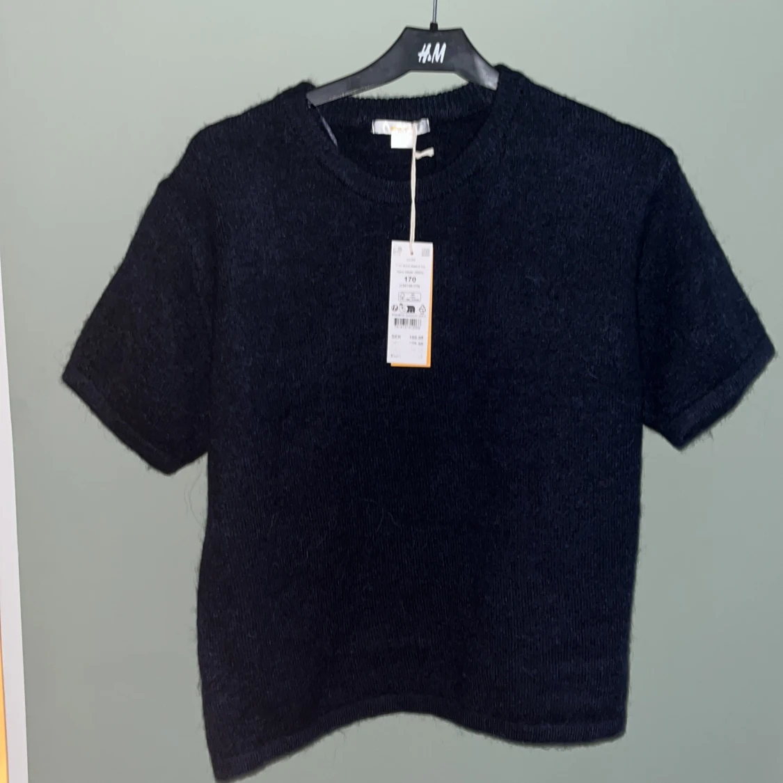 Svart stickad topp från Gina Tricot