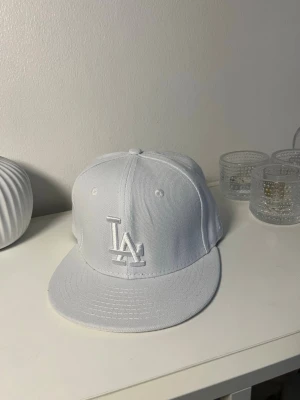 LA Keps Vit - Vit LA Keps i strl 56,8