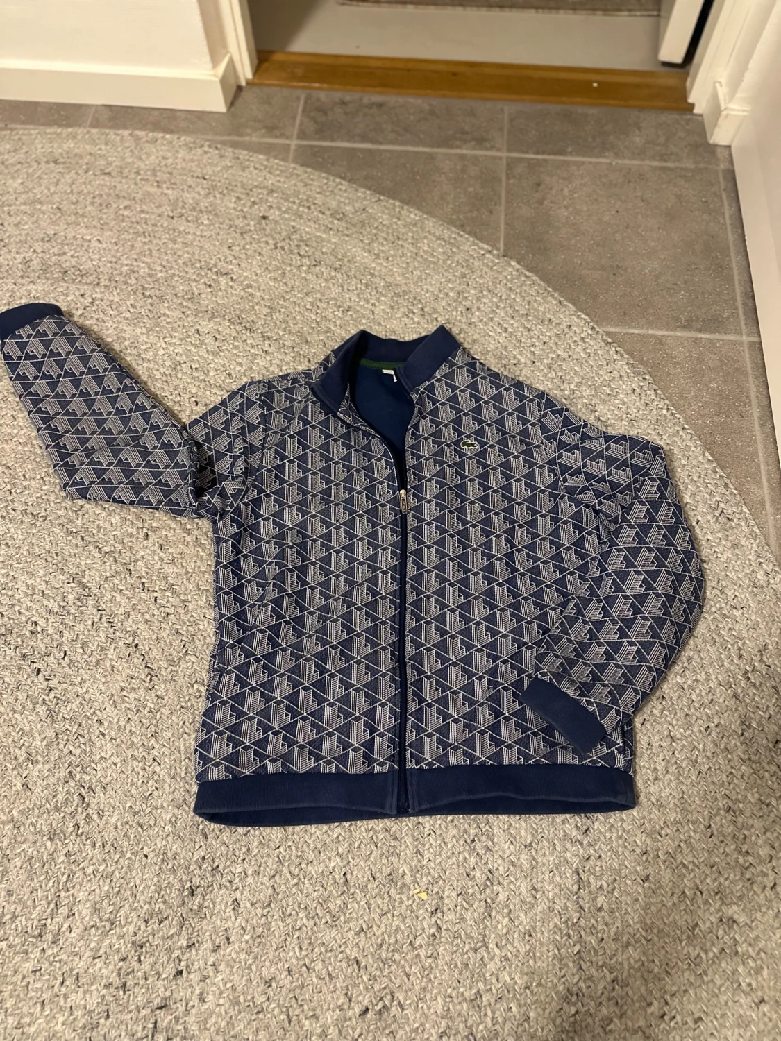 Blå mönstrad zipjacka från Lacoste - 1