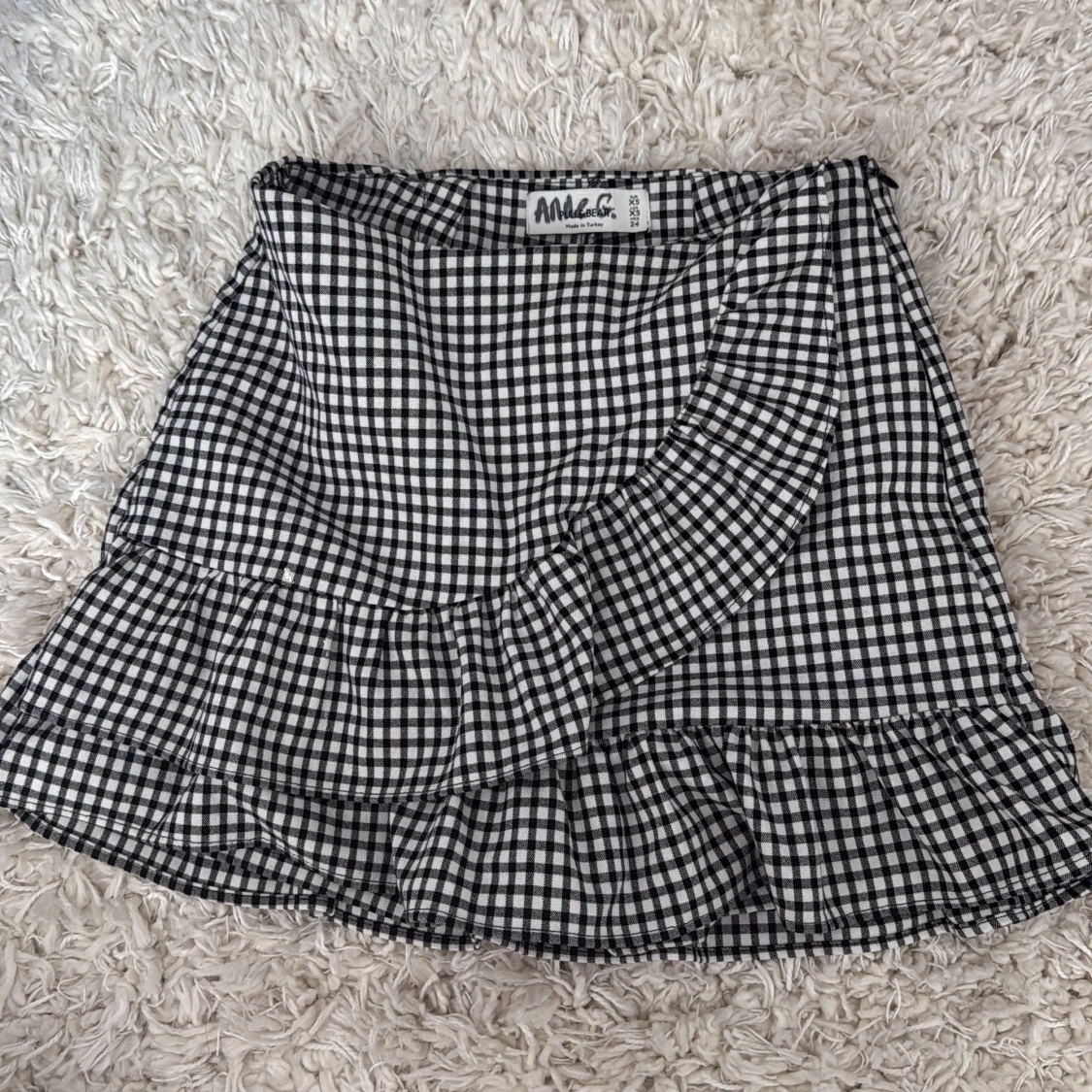 Rutig volangkjol från Pull&Bear XS