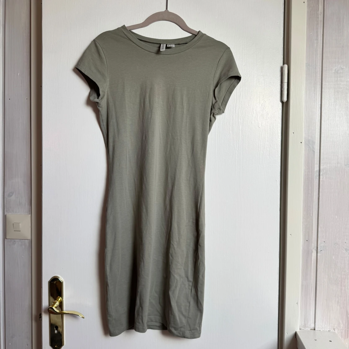 Grön kortärmad klänning från H&M