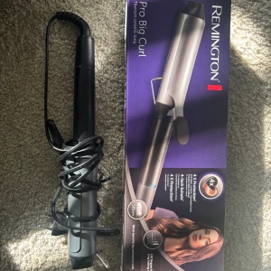 Locktång  - Remington Pro Big Curl locktång. 38mm, upp till 210°C. Inkluderar originalförpackning och manual. Aldrig använd. 