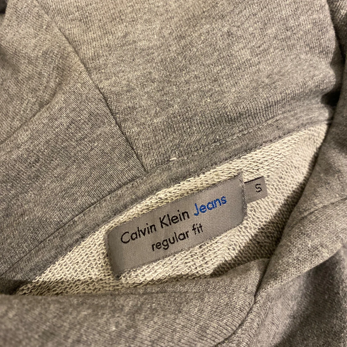 Grå hoodie från Calvin Klein Jeans - 1