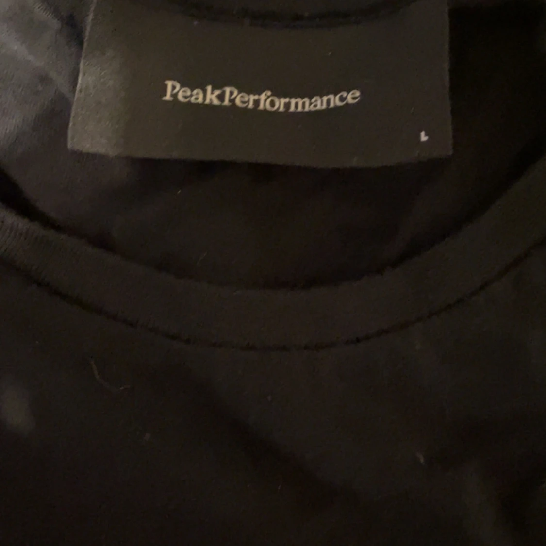 Svart långärmad Peak Performance-tröja - 1