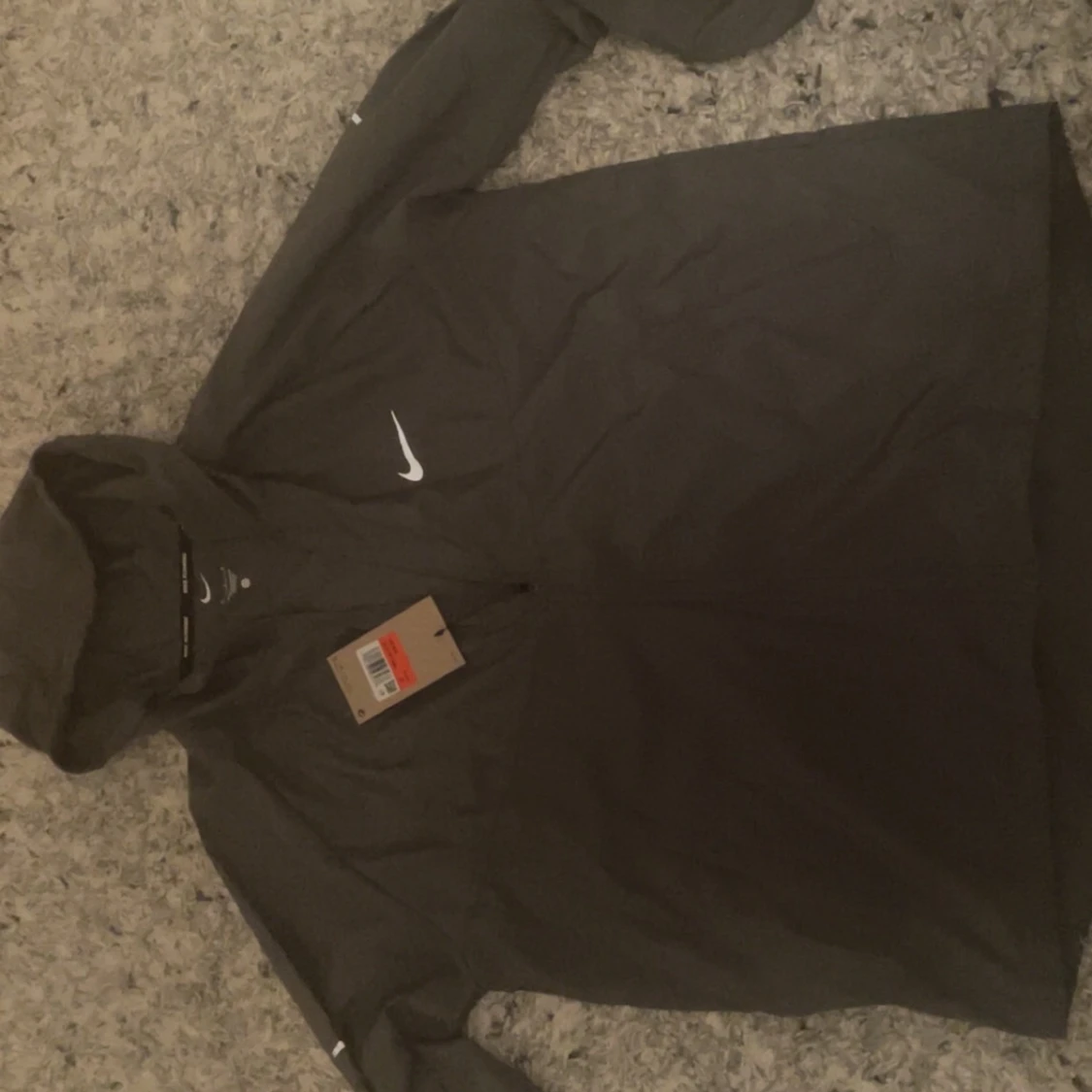 Nike running vindjacka