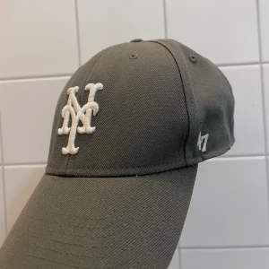 New York Mets Mvp Charcoal/White Adjustable Cap - Wool, acrylic blend. New York Mets Baseball Cap.