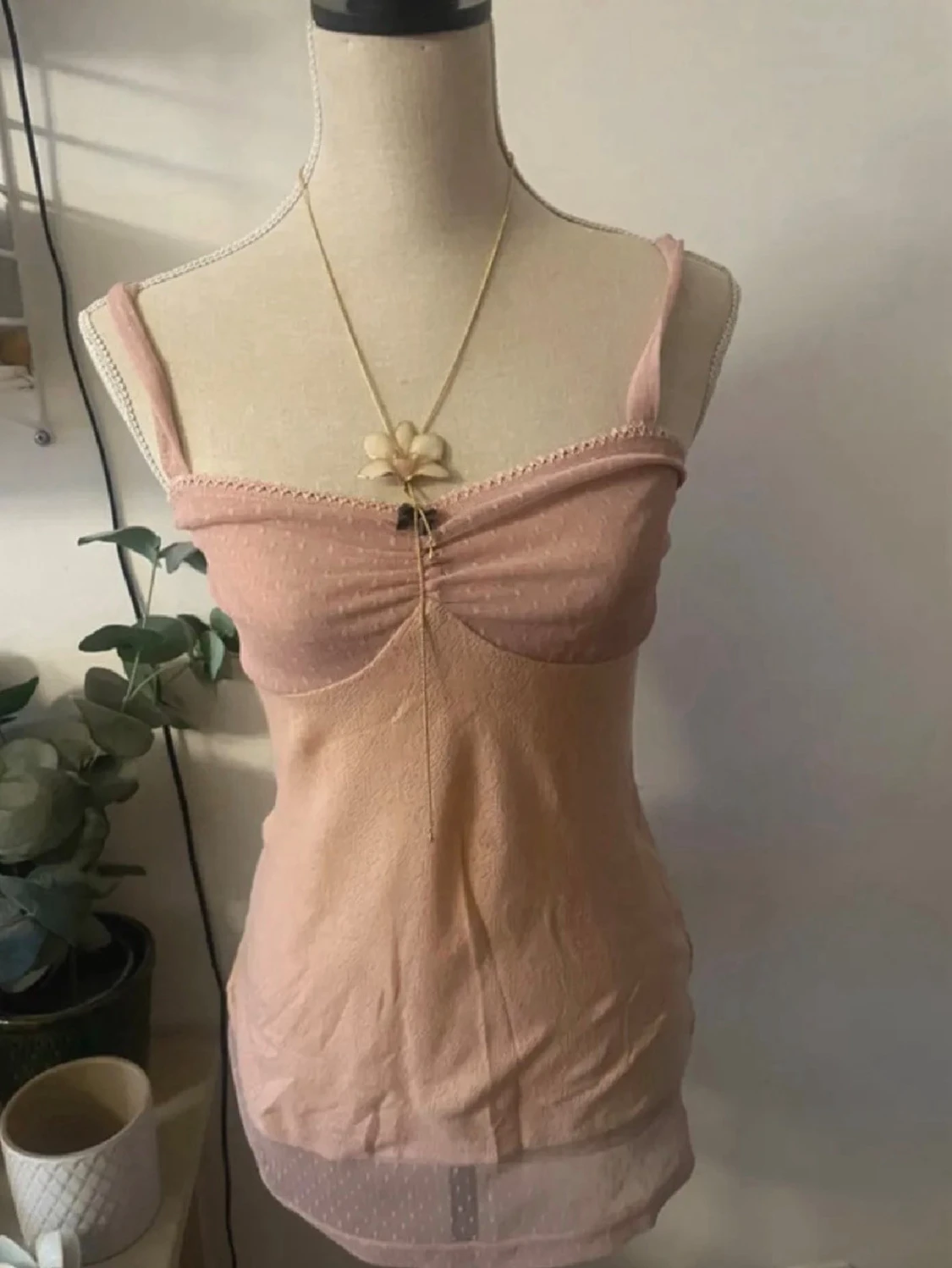 Ljusrosa spetsig linnetopp med rosett