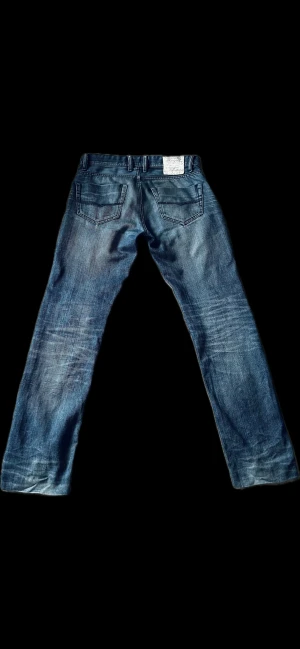 Vintage jeans från fuga denim - Säljer ett par vintage jeans med feta fades, hör av er vid funderingar eller mått. Obs uppsydda 