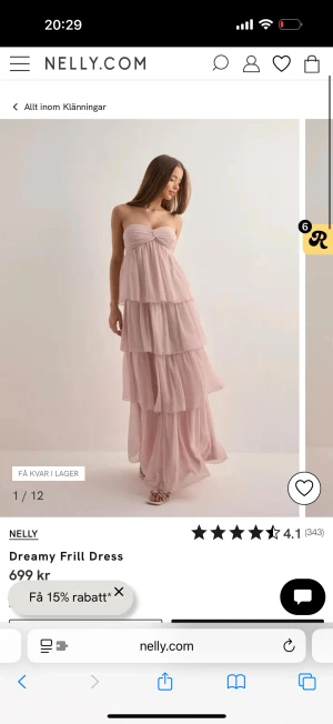 Ljusrosa långklänning från Nelly -  ljusrosa långklänning med volanger, helt oanvänd fortfarande kvar i påsen.  