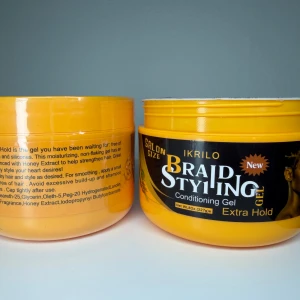 Shone and Jam Gel Extra Hold - Shone and Jam  Braiding  Gel Extra Hold, perfect for braids and styling. The gel is yellow and comes in a round plastic jar of 227g. Contains honey extract and is free from wax, petrolatum and silicones. Moisturizing and provides hold without flaking.