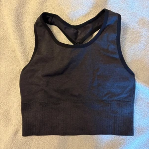 Sporttopp/linne - Sporttopp/linne. Fint skick!